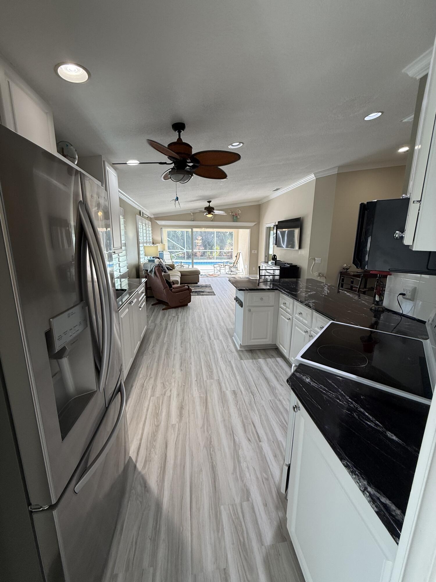 3484 Southeast Cormorant Place Hobe Sound, FL 33455 - Photo 8 of 67 View to pool