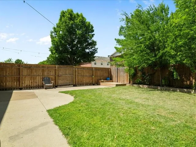 an aerial view of a building with outdoor space