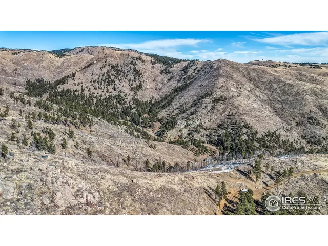 a black and white photo of a mountain