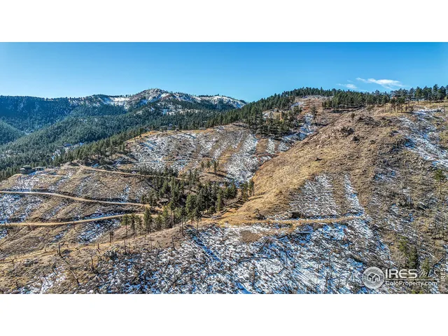 a black and white photo of a road