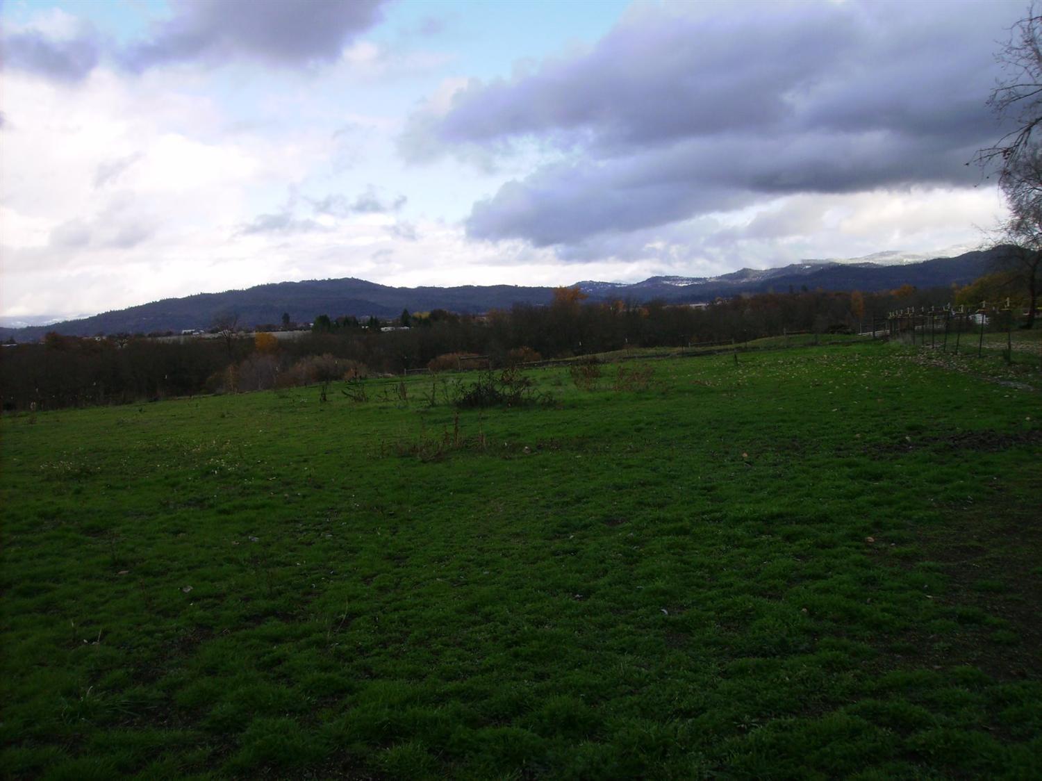 404 Bigham Brown Road Eagle Point, OR 97524 - Photo 13 of 17 a view of outdoor space and mountain view