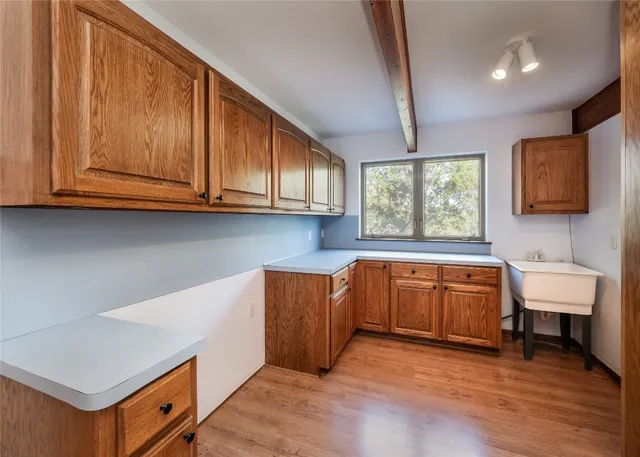 a bathroom with a sink a vanity and a mirror