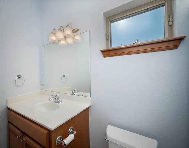 a bathroom with a shower and a toilet