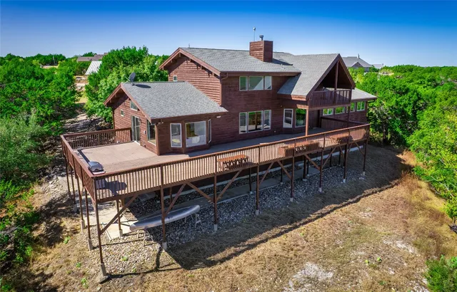 a living room with furniture gym equipment and a view of living room