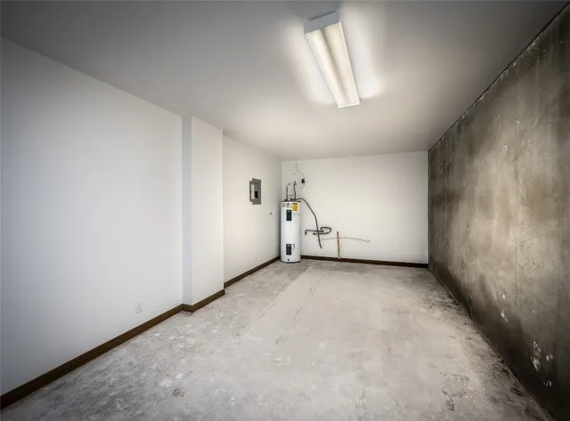 a view of a backyard with wooden fence