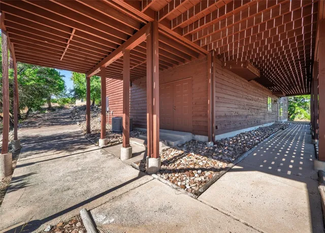 a view of deck with wooden floor and seating space