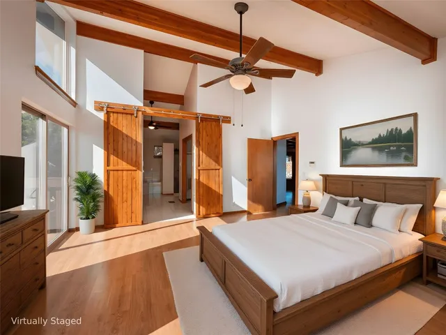 a front view of house with yard and hallway