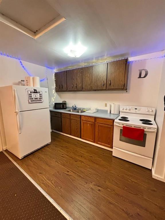 250-256 South 7th Street Indiana, PA 15701 - Photo 13 of 19 a kitchen with stainless steel appliances granite countertop a stove a sink and a refrigerator
