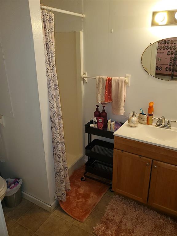 250-256 South 7th Street Indiana, PA 15701 - Photo 6 of 19 a bathroom with a sink and a mirror