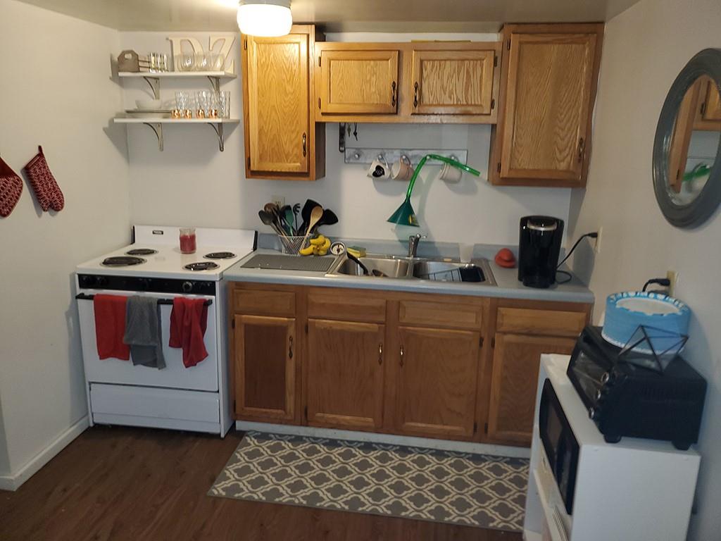 250-256 South 7th Street Indiana, PA 15701 - Photo 10 of 19 a kitchen with a sink and cabinets