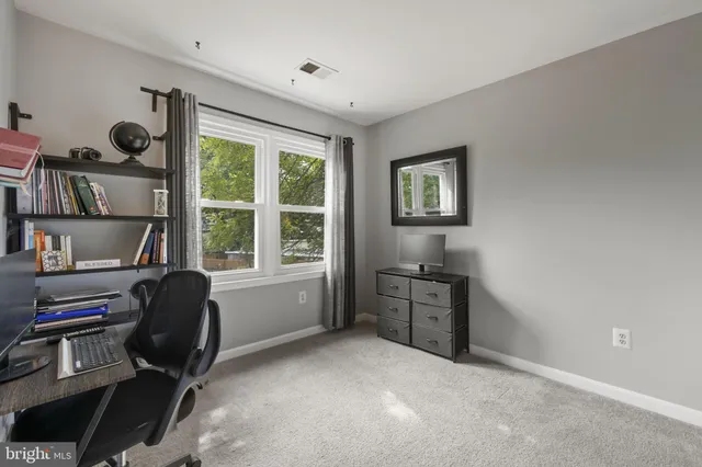 a room with furniture and a window