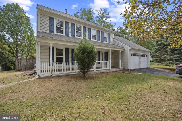 a house with trees in front of it