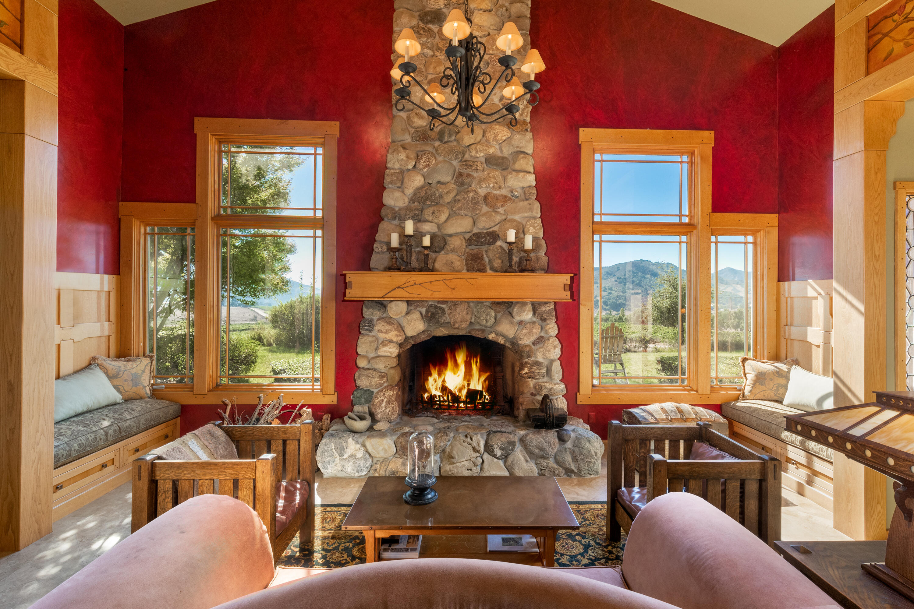 7320 Santos Lompoc, CA 93436 - Photo 10 of 37 a living room with furniture a fireplace and floor to ceiling windows
