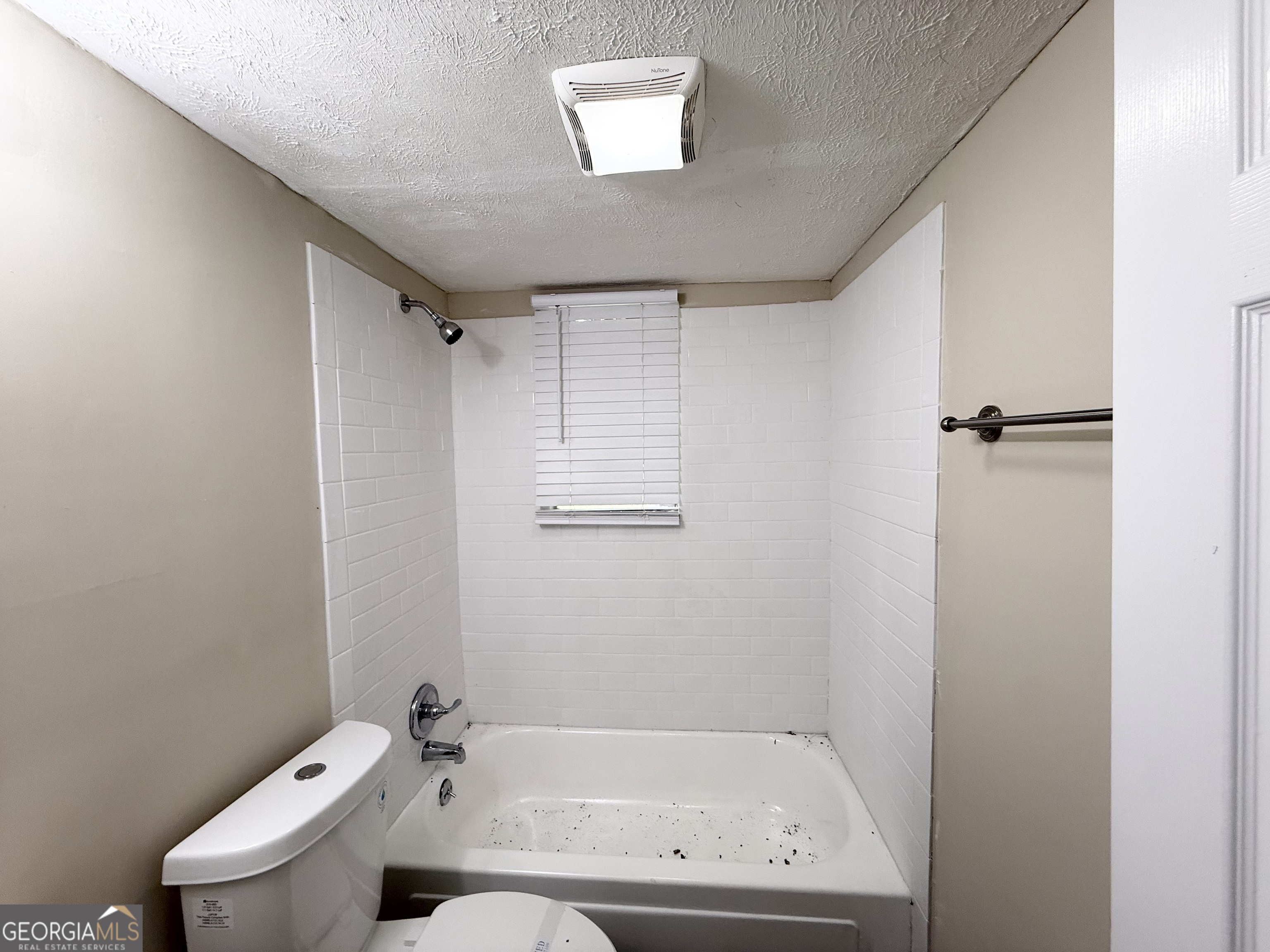2782 Ocean Valley Road Atlanta, GA 30349 - Photo 25 of 27 a bathroom with a sink and toilet