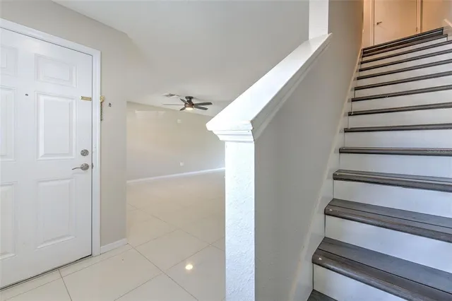 a view of an entryway with staircase
