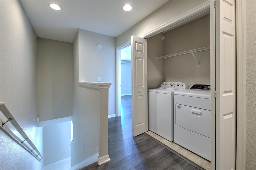 27528 Desert Willow Way Wesley Chapel, FL 33544 - Photo 16 of 24 a room with storage and utility