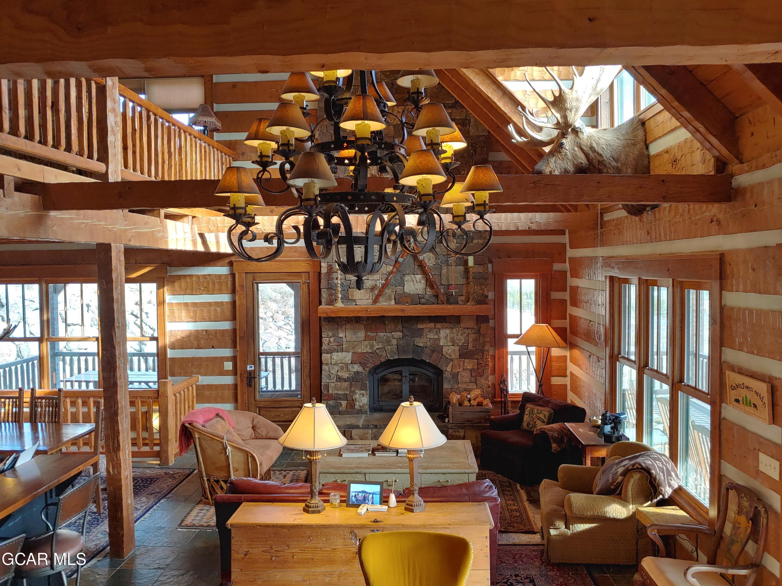 2390 Gcr 41 Road Granby, CO 80446 - Photo 20 of 69 Sunlight bathes this golden space