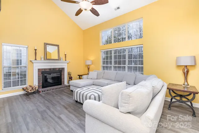 a bedroom with a bed and a fireplace