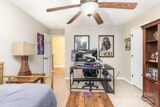 a bedroom with furniture and a bed