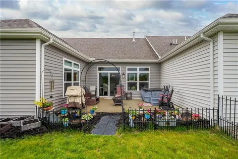 a front view of house with outdoor seating