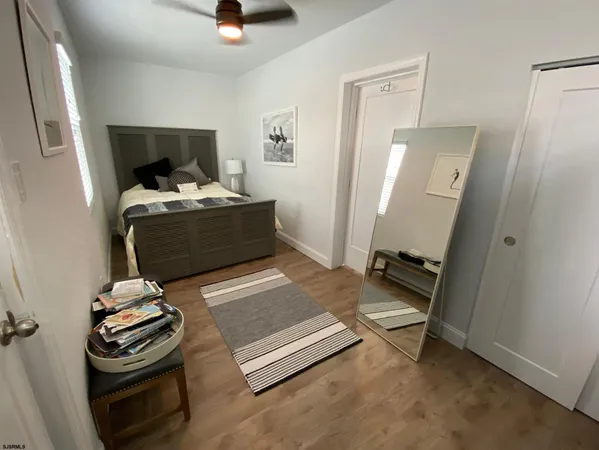 a room with furniture and a wooden floor