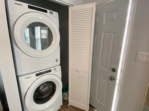 a utility room with dryer and washer