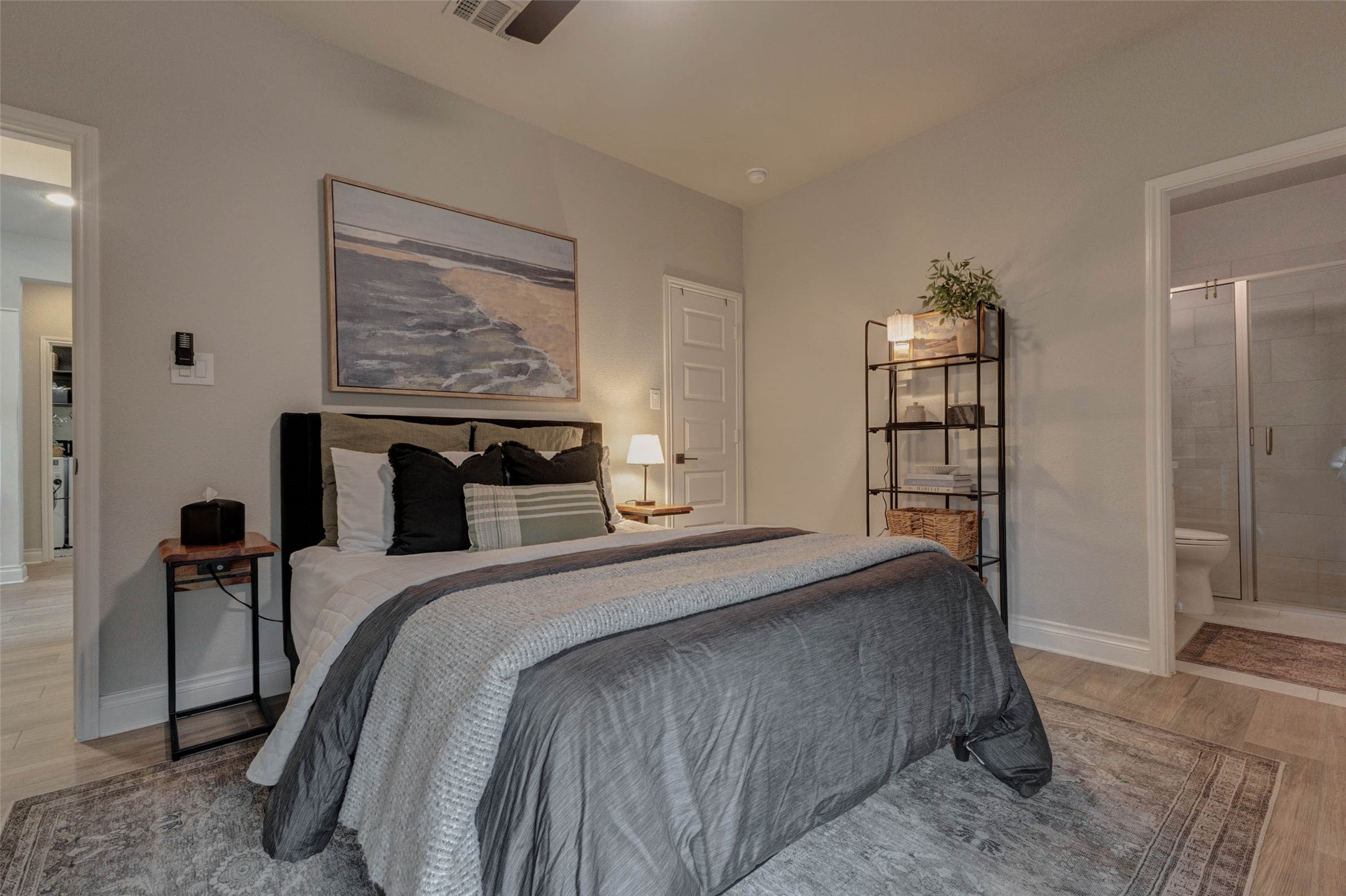 4303 Tupelo Leaf Court Manvel, TX 77578 - Photo 27 of 50 a bedroom with a bed a table and bookshelf