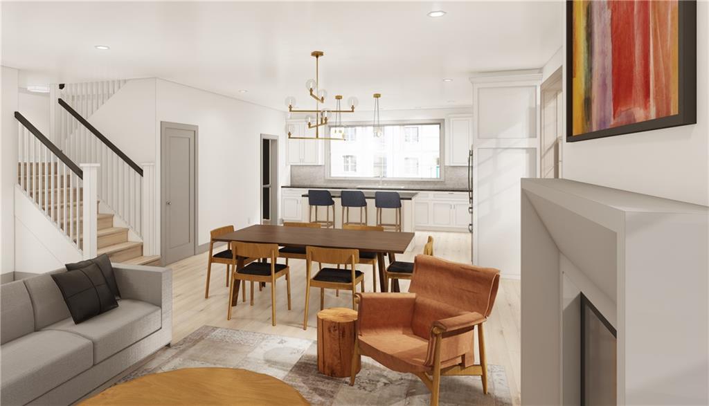 211 Green Street Pittsburgh, PA 15221 - Photo 2 of 22 a living room with furniture a window and a dining table