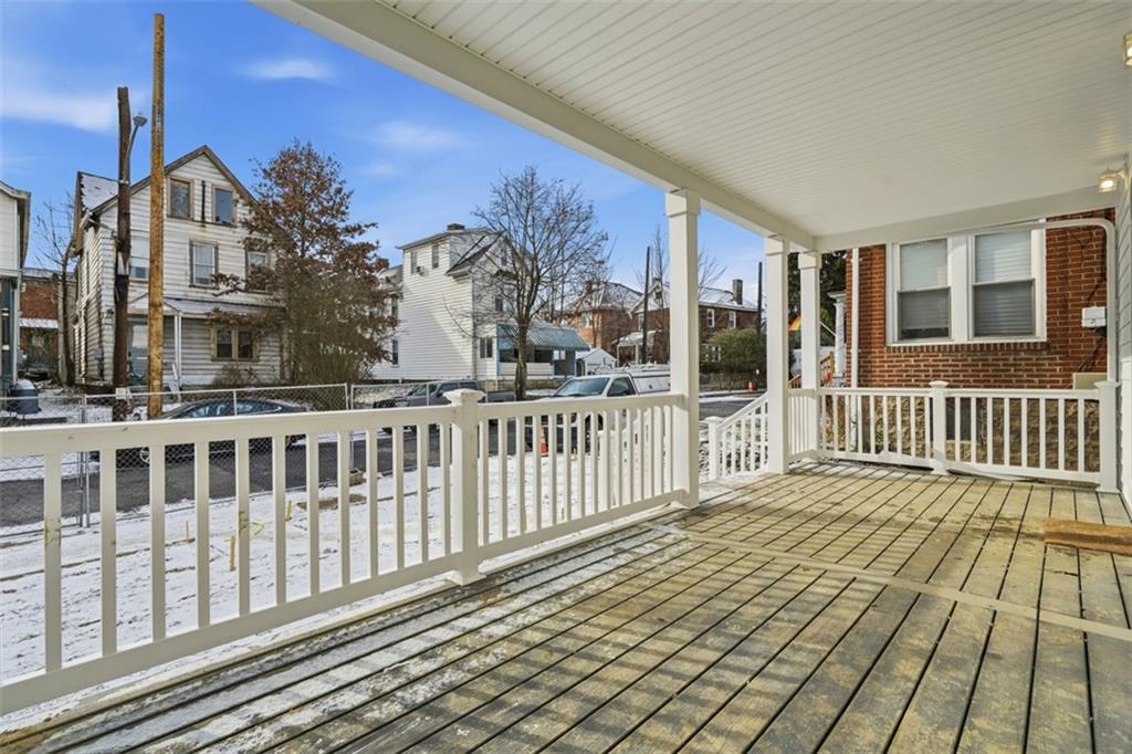 211 Green Street Pittsburgh, PA 15221 - Photo 21 of 22 a view of a house with a small yard