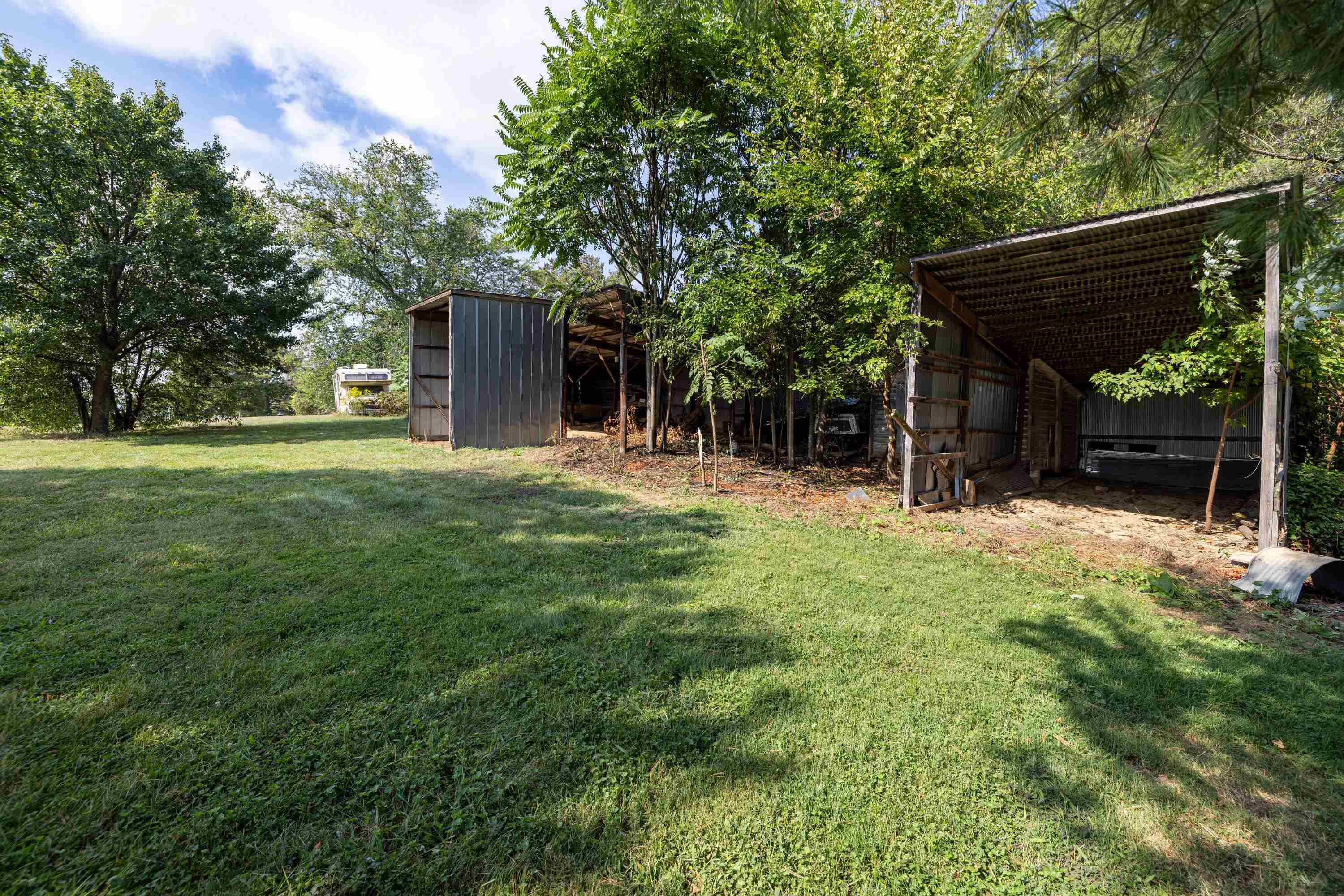 3138 Cross Keys Road Harrisonburg, VA 22801 - Photo 62 of 74 The spacious backyard area offers a shady space and open storage building.