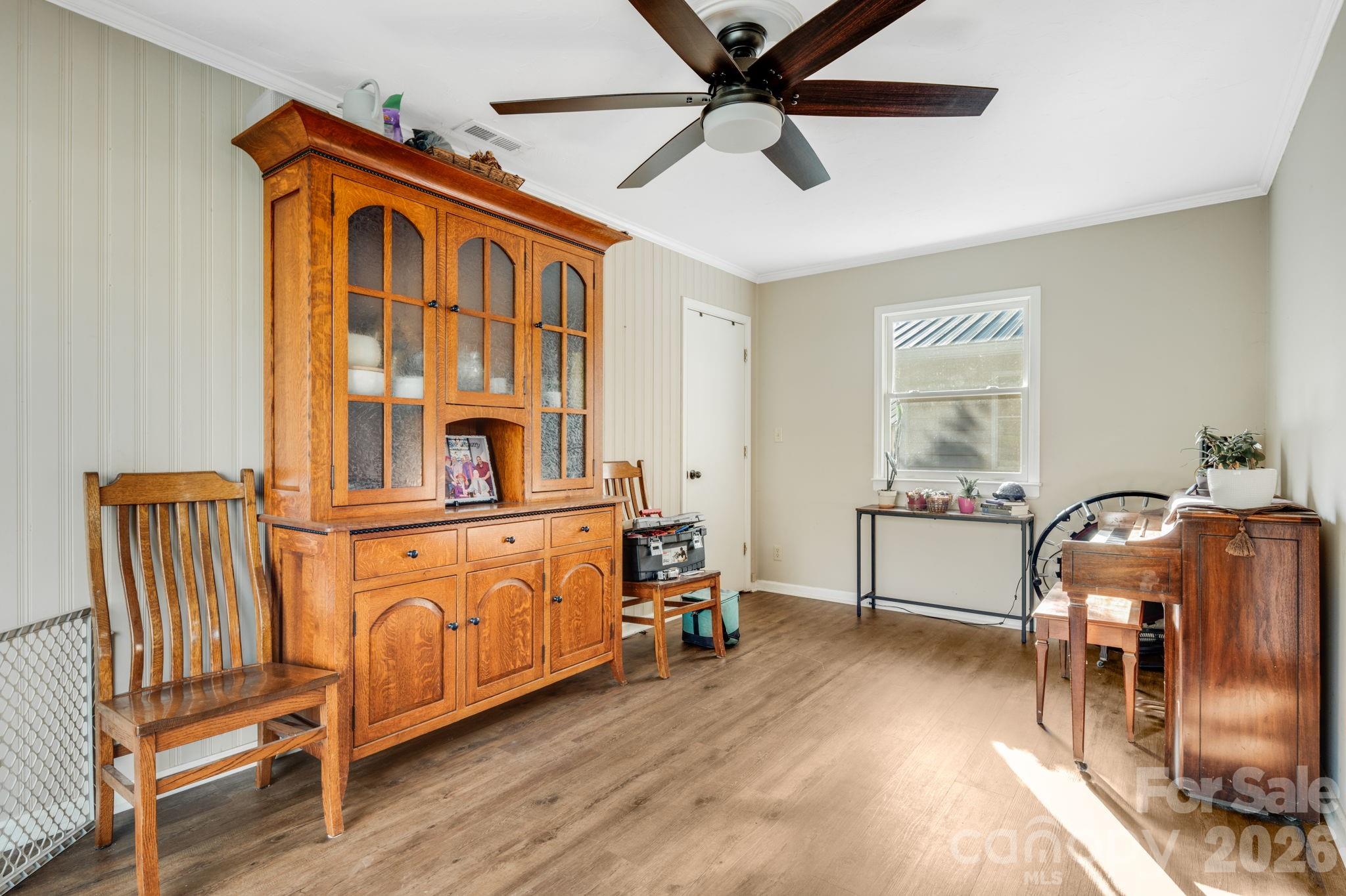 99 South Rowe Road Hendersonville, NC 28792 - Photo 13 of 40 a living room with furniture and a wooden floor