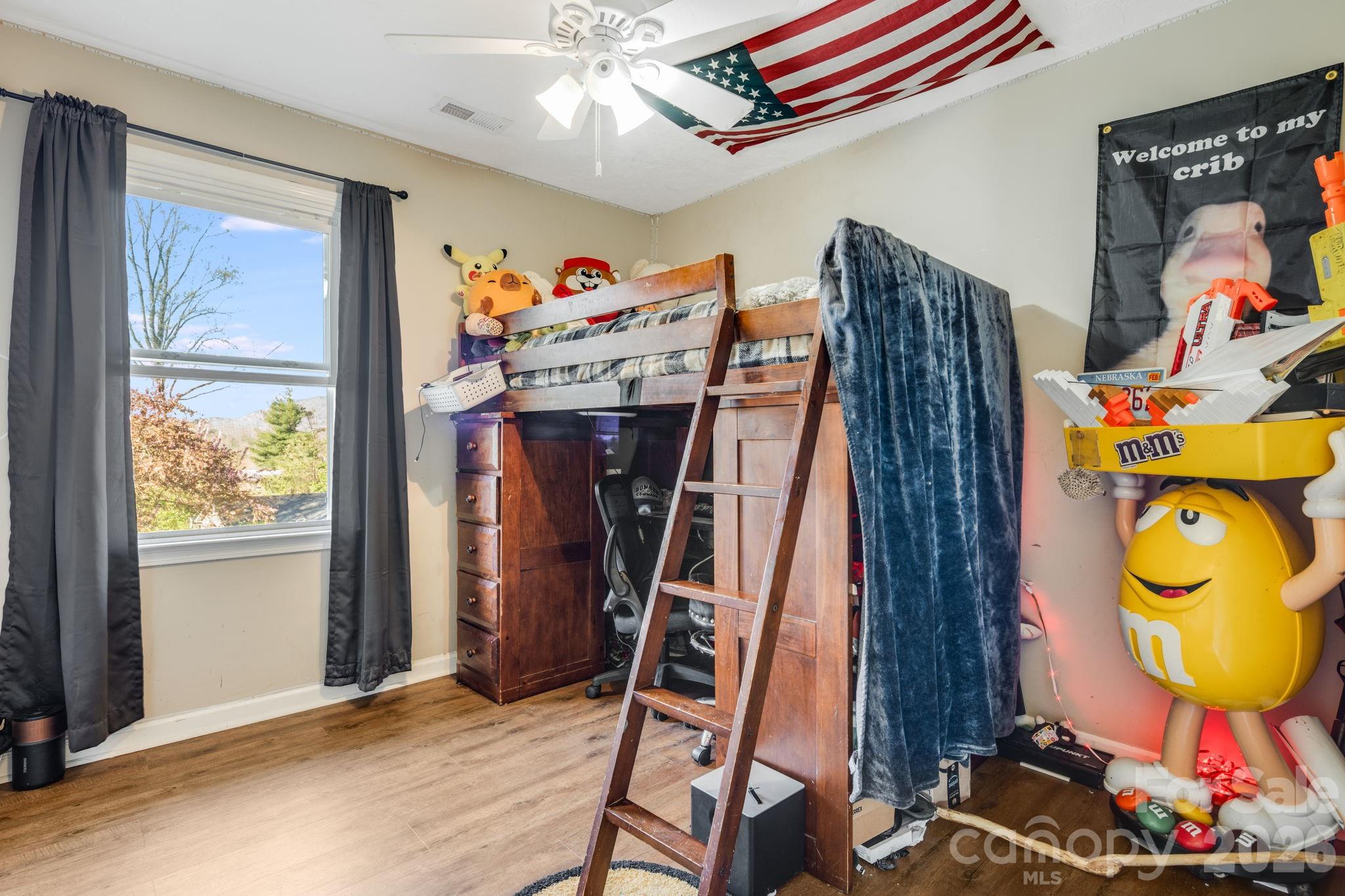 99 South Rowe Road Hendersonville, NC 28792 - Photo 18 of 40 a view of a room with gym equipment