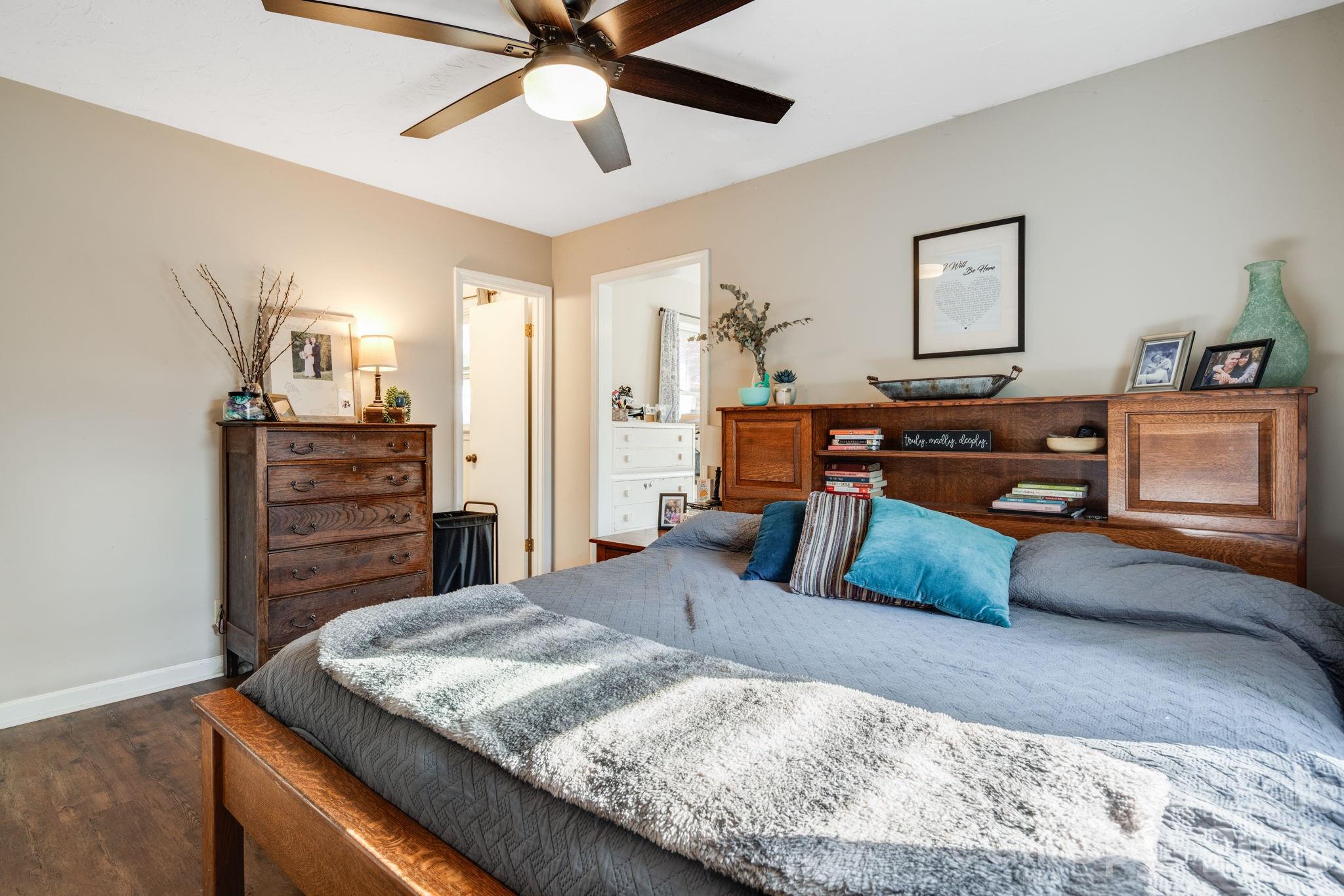 99 South Rowe Road Hendersonville, NC 28792 - Photo 23 of 40 a bedroom with a bed and furniture