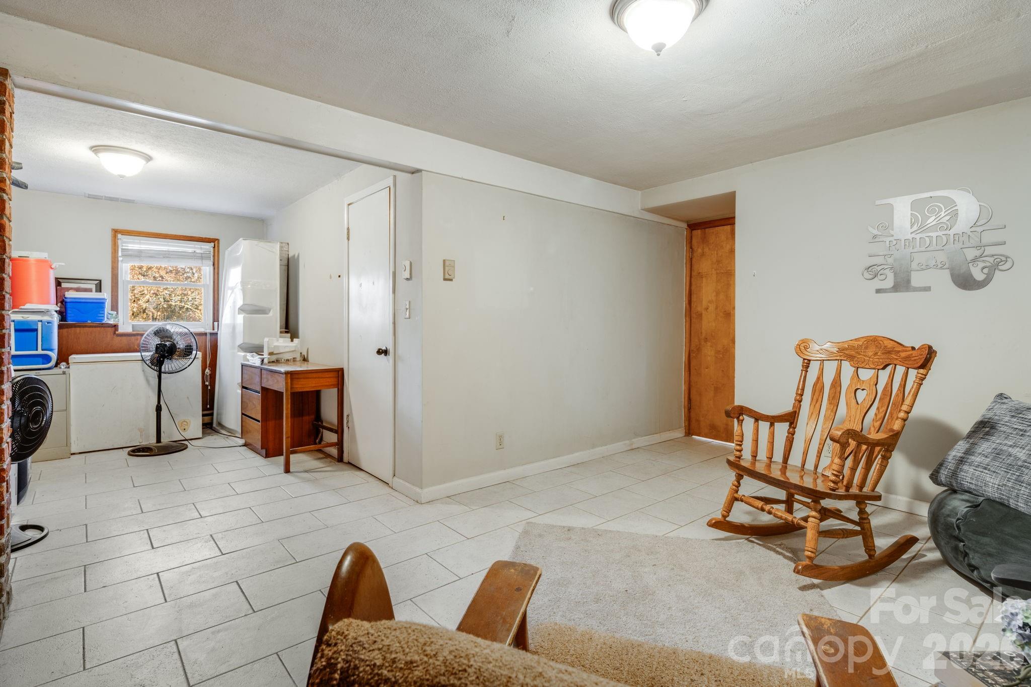 99 South Rowe Road Hendersonville, NC 28792 - Photo 29 of 40 a living room with furniture