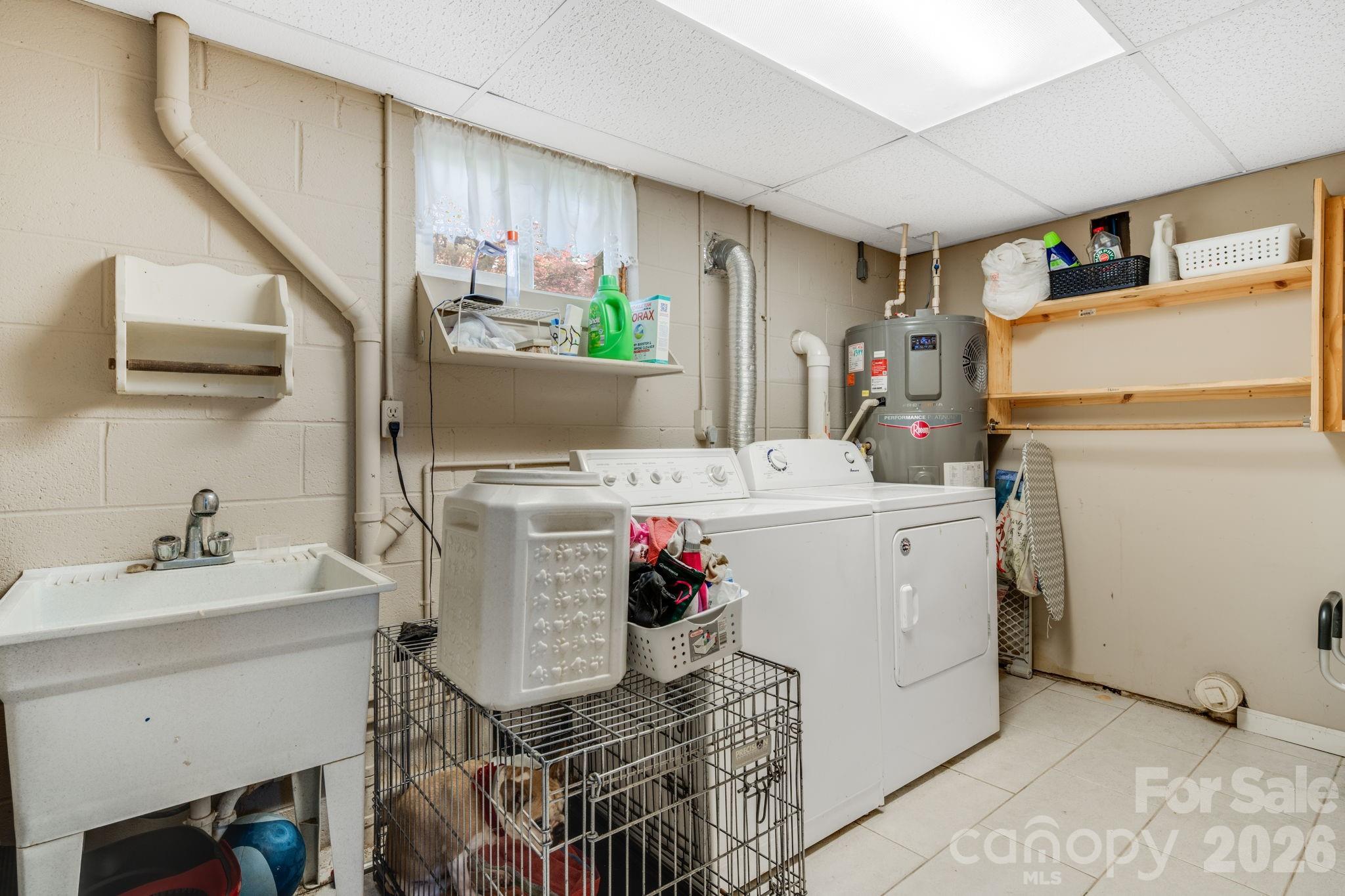 99 South Rowe Road Hendersonville, NC 28792 - Photo 30 of 40 a utility room with dryer and washer