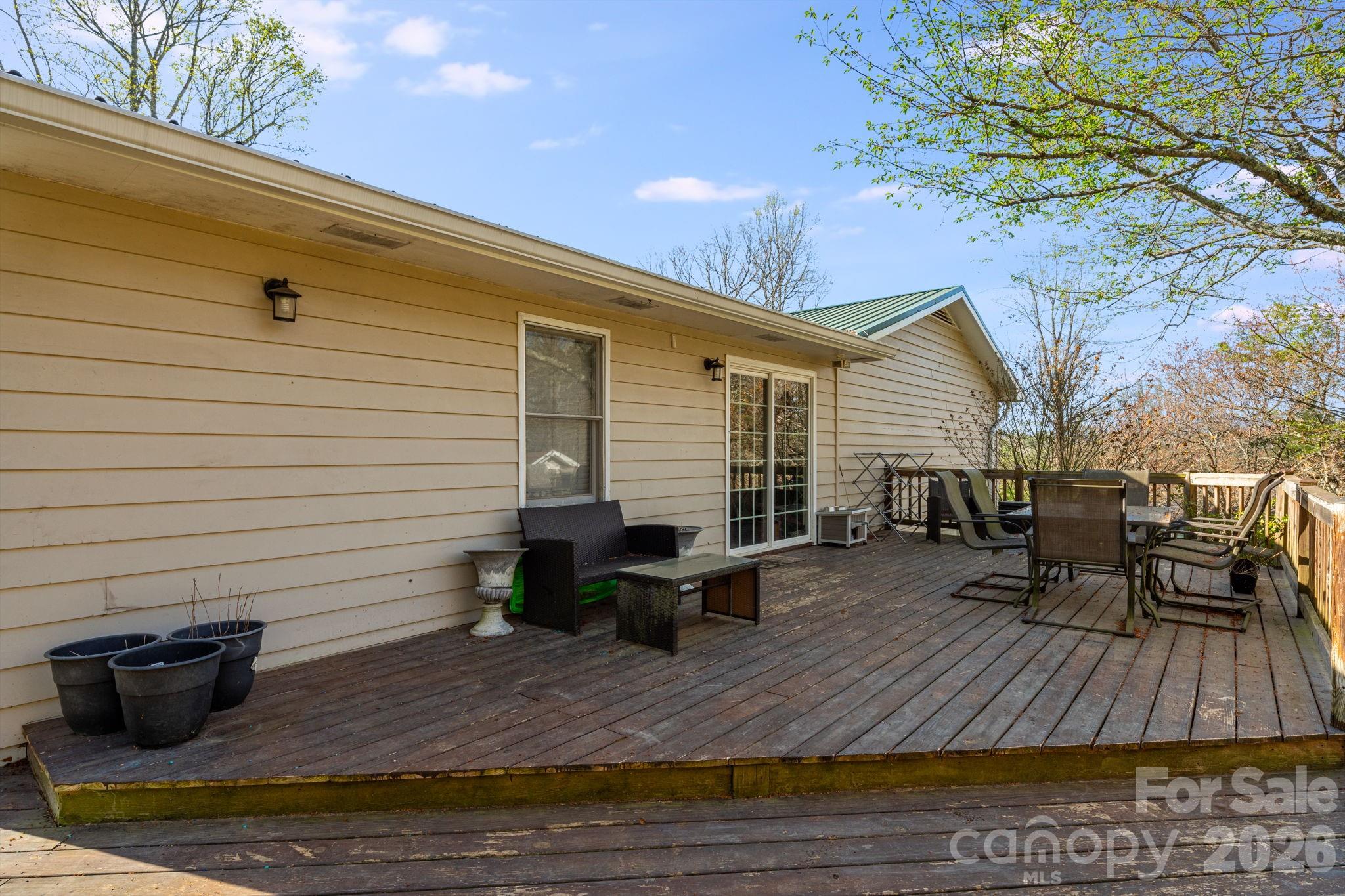 99 South Rowe Road Hendersonville, NC 28792 - Photo 33 of 40 a view of two chairs in the patio