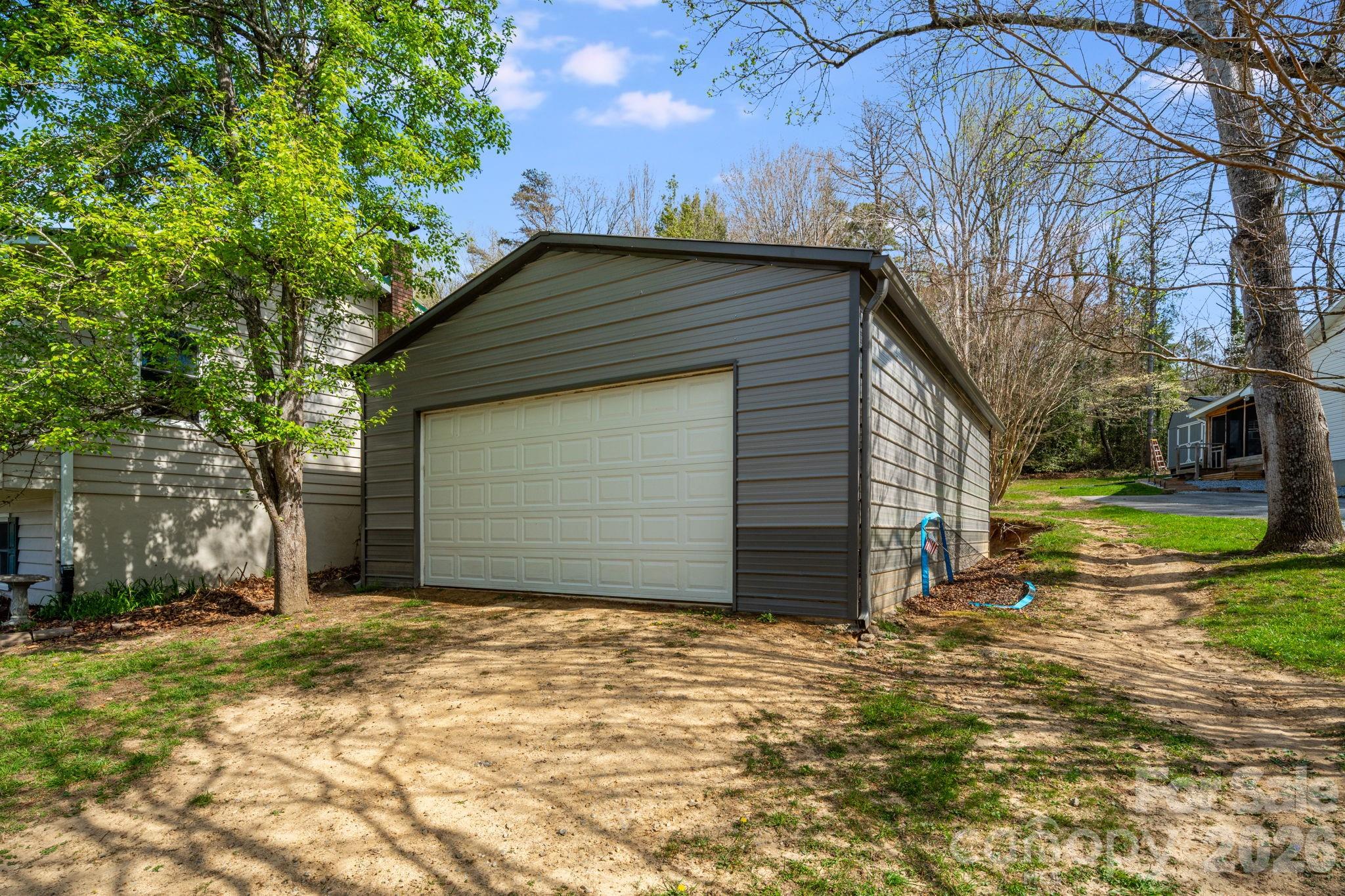 99 South Rowe Road Hendersonville, NC 28792 - Photo 39 of 40 a front view of house with yard