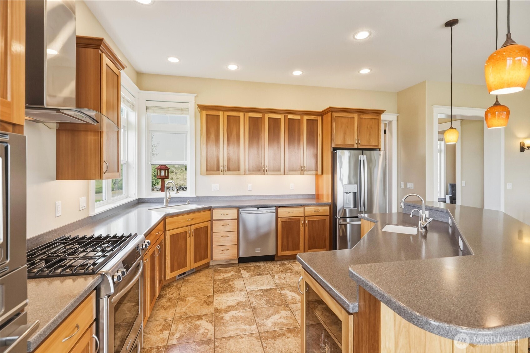 167 Rawhide Road Walla Walla, WA 99362 - Photo 12 of 40 a kitchen with stainless steel appliances granite countertop a sink stove and cabinets