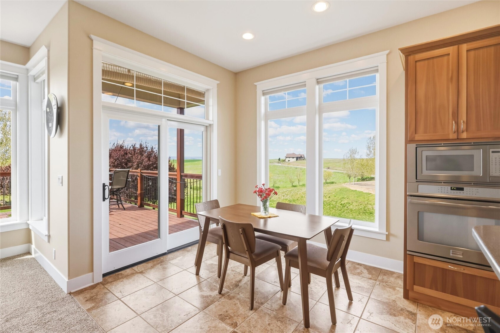 167 Rawhide Road Walla Walla, WA 99362 - Photo 9 of 40 a dining room with furniture and large windows