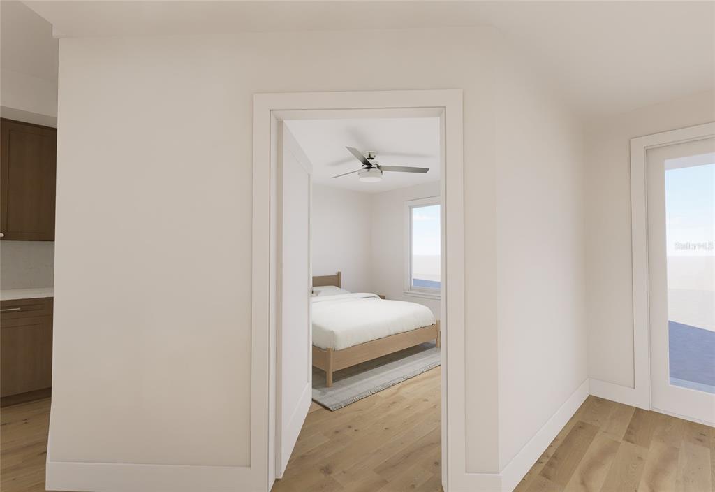 5015 Highway 19, Unit 503 New Port Richey, FL 34652 - Photo 21 of 24 a bedroom with a bed and a window