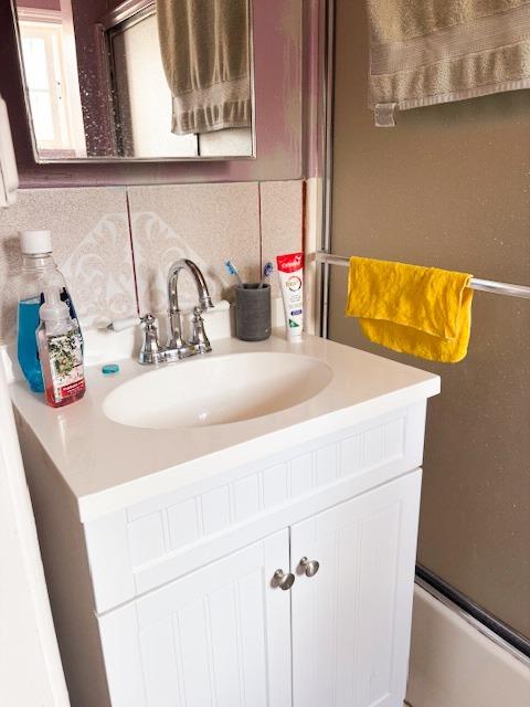 1900 Kenneth Street Modesto, CA 95351 - Photo 7 of 16 a bathroom with a sink and a mirror