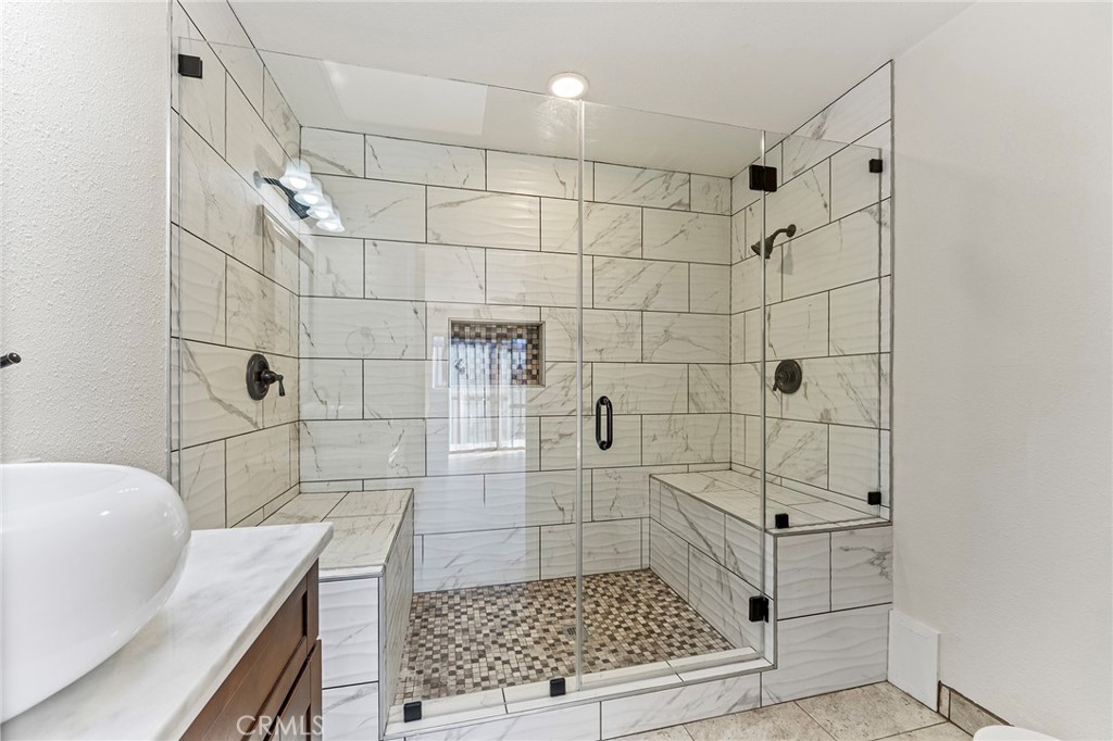 27875 Rainbow Lane Highland, CA 92346 - Photo 18 of 37 a bathroom with a shower