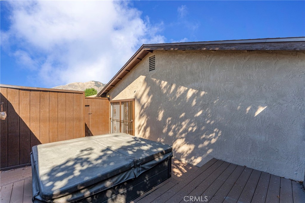 27875 Rainbow Lane Highland, CA 92346 - Photo 28 of 37 a bedroom with a bed and a mirror