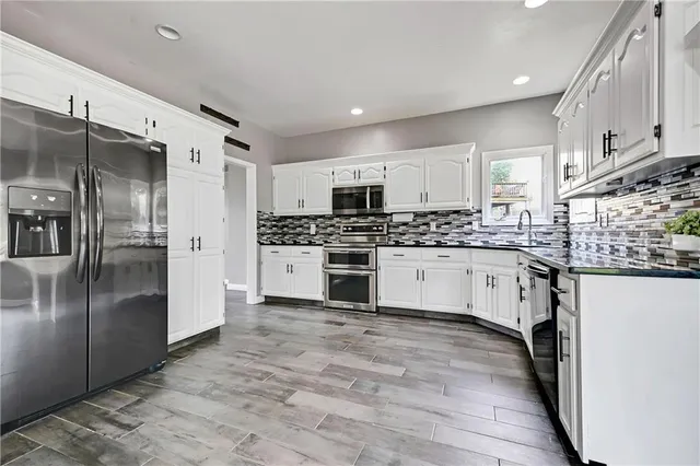 $410,000 | 6700 North Charleston Drive, Kansas City, MO 64119