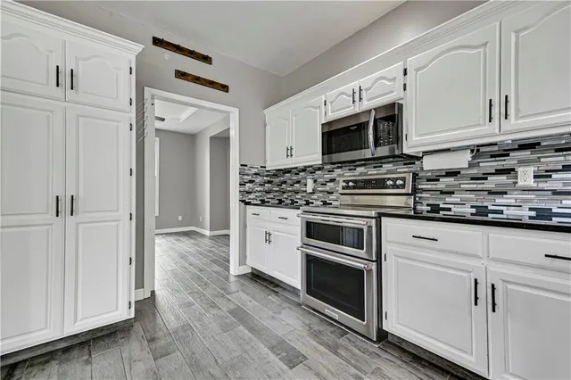 $410,000 | 6700 North Charleston Drive, Kansas City, MO 64119