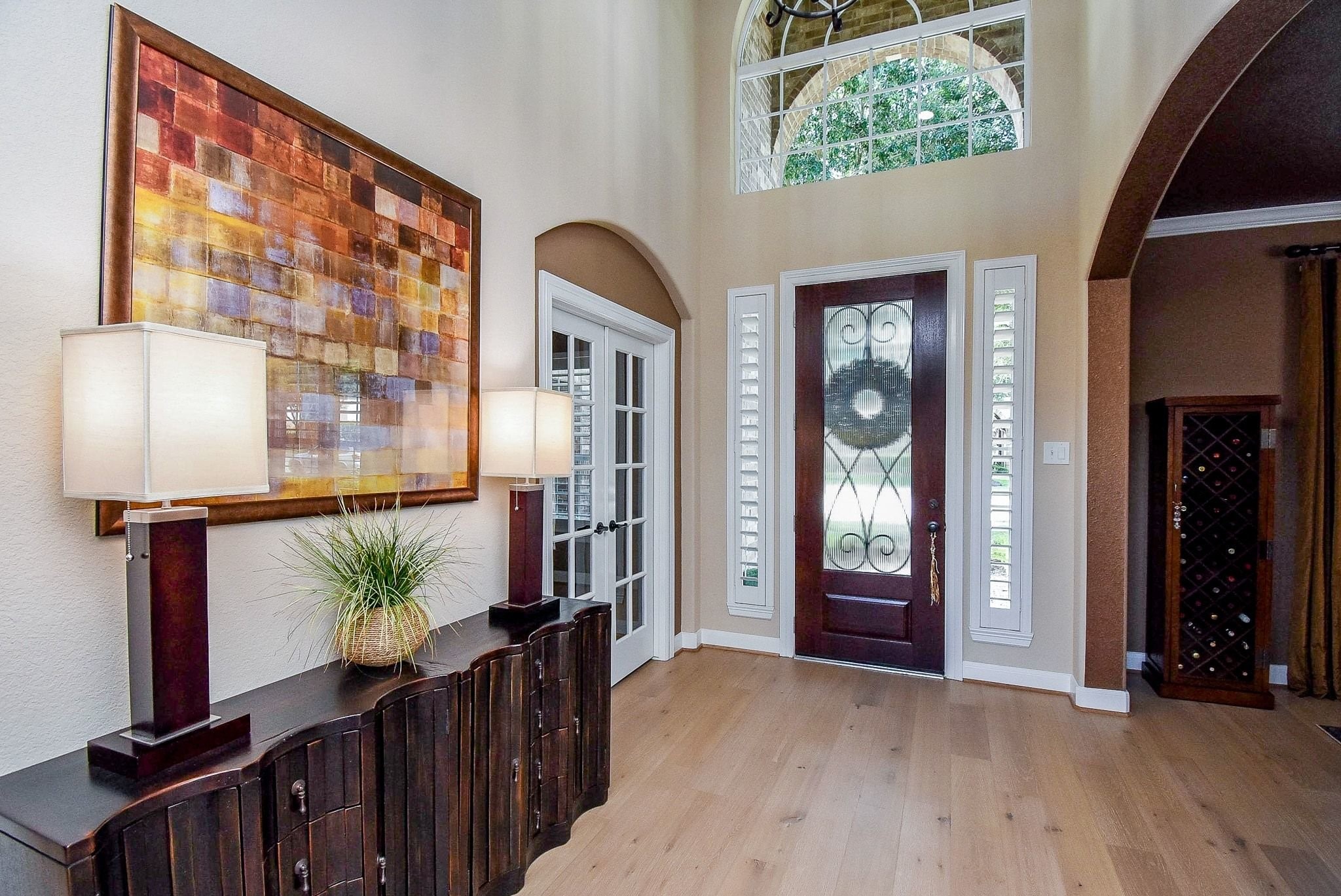27607 Macklind Ridge Lane Katy, TX 77494 - Photo 14 of 50 High ceiling Entry, with office and formal dining room on either side. Engineered wood flooring throughout the main living areas downstairs.