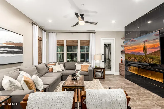 a bedroom with a bed and a night stand