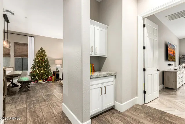 a bathroom with a toilet a sink and a mirror