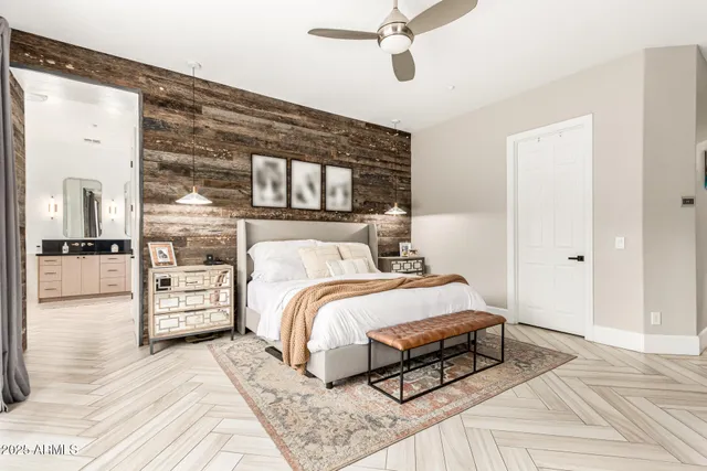 a bedroom with furniture and a book shelf