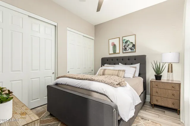 a view of a pool with sitting area